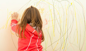 Kid Scribble on the Wall